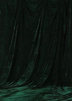 an image of a green velvet background that looks like it could be used as a backdrop