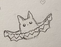 a drawing of a bat with hearts on it's back and wings flying in the air