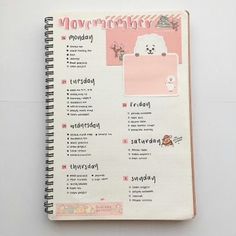 a spiral notebook with the words monday written in pink and white on top of it