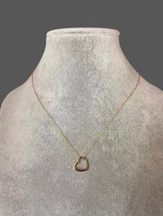 "A sweet and elegant floating 14k gold vermeil heart charm is simply suspended from a 14k gold filled chain.  Choose from a 1mm gold chain with a gold spring ring clasp, or a 1.5mm gold chain with a gold lobster clasp. Each chain measures 16\" with an extension to 18\".  Please send a message if a different length chain is desired. A wonderful gift for a bride, bridesmaid, best friend, or anniversary! Floating heart charm: 13x13mm  Total length of charm: 1/2\" Gold chain: 1mm or 1.5mm This neckl Delicate Rose Gold Open Heart Jewelry, Minimalist 14k Gold Filled Open Heart Jewelry, Everyday 14k Gold Open Heart Necklace, 14k Gold Filled Heart Shaped Rose Gold Jewelry, Heart-shaped Rose Gold 14k Gold-filled Jewelry, Rose Gold Heart-shaped 14k Gold Filled Jewelry, 14k Gold Open Heart Necklace For Valentine's Day, 14k Rose Gold-filled Heart Jewelry, Rose Gold 14k Heart Pendant Necklace