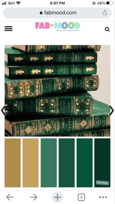 some books are stacked on top of each other with the colors green and gold in them