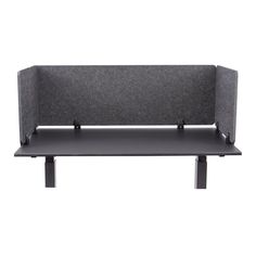 a gray couch with two black legs and a grey backboard on the top shelf