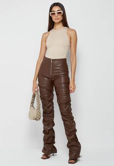 PRODUCT DETAILS Material: Polyester Waist Type: High Closure: Zipper Pattern Type: Solid Decoration: Ruched, Straps Length: Ankle Length Thickness: Standard Style: Leather, Elegant, Party, Casual Available In: Brown Size: S, M, L, XL, XXL View RETURN POLICY Brown Leather Trousers, Stacked Pants, Brown Leather Pants, Hip Style, Long Leggings, Flared Trousers, Bungee Cord, Flare Trousers, Trouser Style