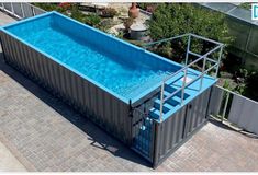 an above ground swimming pool is shown in the middle of a brick patio with stairs leading up to it