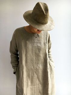 "Super comfortable, loose linen tunic with pockets and long sleeves for everyday wear. Perfect with trousers and leggings as it falls over your hips. Great texture and lovely wrinkles. Made from high quality medium weight natural linen that will become softer and more distinctive with every wash. Choose either the natural undyed linen or any of the other colors we offer. No zipper or buttons - just put it on and dive into your day with style and comfort! Each piece is individually cut, sawn and Linen Shirts Women Tunic Tops, Tunic Linen, Linen Tunics For Women, Tunics For Women, Plus Size Tunic, Linen Tunic Dress, Linen Tunic Tops, Work Blouses, Plus Size Coats