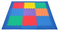 a colorful foam floor mat with squares on it