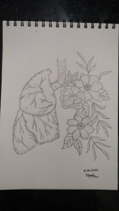 a drawing of a teddy bear and flowers