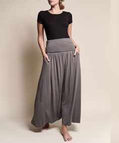 Same construction as our yoga jogger waist., Maxi skirt with pockets., Must have item., Flared bottom , Banded waist.INCHES SMALL MEDIUM LARGELENGTH 39 39 1/2 40 WAIST 25 27 29 Made In: MADE IN USAFabric Contents: 95% Organic Bamboo, 5% SpandexCare Instructions: machine washSize Measurement (inch): S: 25.0 (Waist), null (Hips), null (Length) M: 27.0 (Waist), null (Hips), null (Length) L: 29.0 (Waist), null (Hips), null (Length) Maxi Skirt With Pockets, Kimono Wrap, Skirt With Pockets, Skirts With Pockets, Sweater Hoodie, Sustainable Fashion, Jumpsuit Dress, Sunnies, Dress Skirt