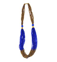 This multi- strand bead necklace is made by hand by the Maasai women in Kenya. | This multi- strand bead necklace is made by hand by the Maasai women in Kenya. No two are exactly alike, making each piece a truly unique work of art! Maasai beadwork embodies the whole of Maasai culture representing beauty, strength, tradition, warriorhood, social status and their deep love and devotion for their cattle. The age old artform is practiced by women of the village who learn from their mothers, who lear Maasai Culture, Multi Strand Beaded Necklace, Travel Necklace, Social Status, Lapis Blue, Maasai, Deep Love, Multi Strand Necklace, Artisan Craft