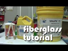 there is a yellow container with paint on it and the words fiberglar tutorial next to it