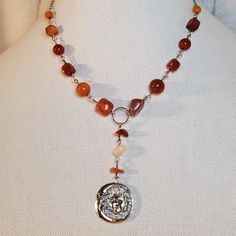 Orange And Red Theme Quartzite, Carnelian, And Fire Agate Beaded Cresent Moon And Sun Charm Necklace. Charms Are Approximately 28x24mm. Necklace Measures 16 Inches With A Lobster Clasp And 1.5 Inch Extension Chain. Chain Can Be Made Longer Or Shorter Upon Request! #Moon #Sun #Silver #Boho #Hippie Red Carnelian Spiritual Jewelry, Silver Carnelian Bohemian Necklaces, Bohemian Silver Carnelian Necklaces, Silver Carnelian Bohemian Necklace, Silver Carnelian Beaded Necklace With Gemstone Beads, Silver Beaded Carnelian Necklaces, Silver Spiritual Jewelry With Carnelian, Silver Beaded Carnelian Necklace, Silver Carnelian Beaded Necklace