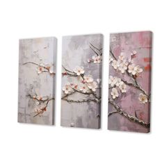 three pieces of art with white flowers on the top and one piece is pink, grey and