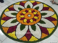 a colorful flower design is on the floor