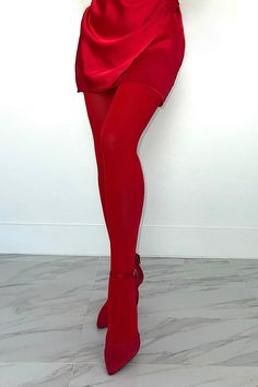 Experience the luxurious feel of our buttery soft red tights – where comfort meets a daring splash of color for a standout look.   Red Tights Opaque Buttery Soft Size: One Size Height: 5'-5'10 Weight: 100-175lbs Material: 86% Nylon, 14% Elastane Thigh-high Compression Bottoms For Night Out, Red Knee-high Winter Legwear, High Waist Tights For Night Out, Tight Spring Hosiery, Full Length Tights For Spring, High Stretch Solid Tights For Spring, High Stretch Solid Color Tights For Spring, Trendy Red Thigh High Tights, High Stretch Solid Legwear For Spring