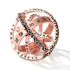 a rose gold ring with words on it