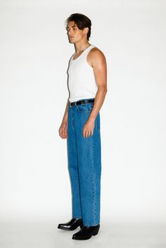 A classic pair of straight-leg jeans inspired by the off-duty uniform of 90's runway models. Designed to pinch just above the hips, the high-rise and roomy straight-leg elongates the leg for a rugged, boyish cut. Constructed in a rigid, non-stretch denim, these go-to jeans only gets better with age. Pair with the match High Waist Jeans Men, Classic Rigid Denim Flare Jeans, Classic Rigid Denim Flare Jeans For Everyday, Classic Flare Jeans In Rigid Denim For Everyday, Classic Cropped Jeans With Belt Loops And Straight Hem, Straight Fit Rigid Denim Cropped Jeans, Rigid Denim Flare Jeans With Straight Hem, Straight Fit Cropped Jeans With Rigid Denim, Classic Cropped Jeans In Rigid Denim With Straight Hem