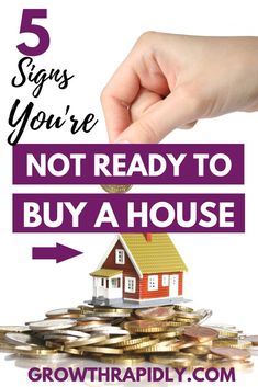 a hand reaching for money with the words 5 signs you're not ready to buy a house