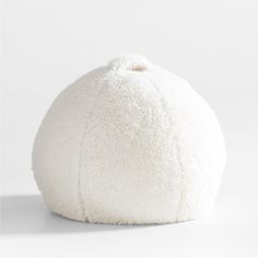 a white bean bag sitting on top of a table