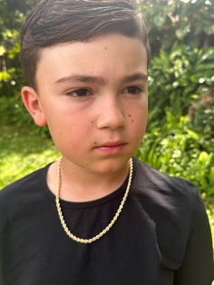 One of its kind!  A Thick 4mm Gold Filled Rope Chain is the perfect necklace for your kid's everyday wear. Need a gift for Father's day or Mother's Day? Match your baby's necklace with an adult size.  Material: 18K Gold Filled. Our gold-filled pieces are bonded with 8 layers of real gold. This makes our jewelry high quality and long lasting and a great alternative to solid gold for a fraction of the price. Our pieces are 100% lead and nickel free making them hypoallergenic and a great option for Boy Necklace, Boys Necklace, Baby Necklace, Godparent Gifts, Life Partner, Rope Chain Necklace, God Parents, Alessandra Ambrosio, Childrens Jewelry