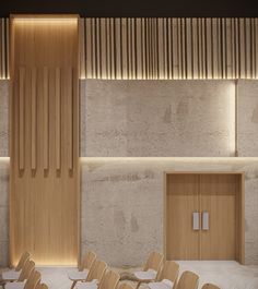 an empty conference room with wooden chairs