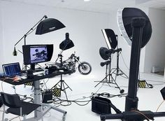 a photo studio with multiple lighting equipment