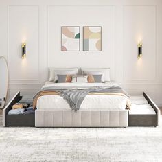 a bedroom with a large bed and white walls