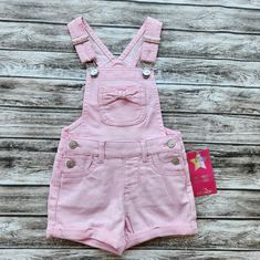 Jordache 2t Light Pink Overall Shorts Pink Bow On The Front Pocket Rhinestone Hearts On The Buttons 65% Cotton 33% Polyester 2% Spandex Pink Overall Shorts, Light Pink Overalls, Kids Dungarees, Pink Overalls, Kid Clothes, Group Costumes, Pinkie Pie, Rhinestone Heart, Baby Outfits