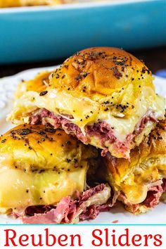 the reuben sliders are stacked on top of each other