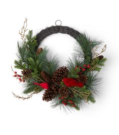 a wreath with pine cones and red berries