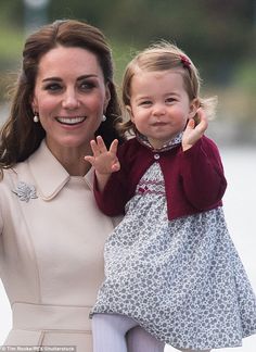 the duke and princess of cambridge wave as they walk with their baby daughter, charlotte