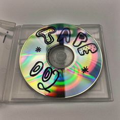 a cd that is sitting on top of a plastic case with the word rap written on it