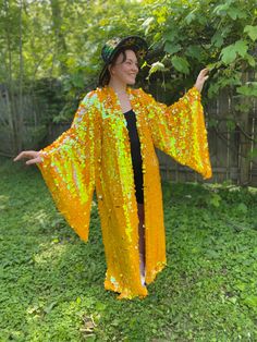 Our signature bell sleeve Sequin kimono in our new fabulous color! Be sure to watch the video to see it in different light. It reads more people in certain light and the color is always shifts. Super magical and mesmerizing!