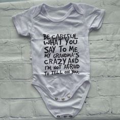 Unisex Baby Bodysuit. New With Tags, Never Worn. #Tds202m Playful White Onesie With Letter Print, Playful White Letter Print Bodysuit, Playful White Bodysuit With Letter Print, White Short Sleeve Bodysuit With Letter Print For Playtime, Fitted White Short Sleeve Bodysuit With Letter Print, Short Sleeve White Onesie For Playwear, Unisex White Short Sleeve Cotton Bodysuit, White Fun Bubble Romper For Playwear, Unisex White Cotton Short Sleeve Bodysuit