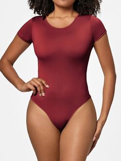 Features: Basic style Sheer: Opaque Stretch: Slightly stretchy Material composition: 79.3% polyester, 20.7% spandex Care instructions: Machine wash cold. Tumble dry low. Imported Size US Top Length Bust Waist Hip Shoulder Sleeve Length S 2/4 26.2 26.8 22 25.2 12.6 4.9 M 6 26.8 28.3 23.6 26.8 13.4 5.3 L 8 27.4 29.9 25.2 28.3 14.2 5.7 XL 10 28 31.5 26.8 29.9 15 6.1 2XL 12 28.5 33.1 28.3 31.5 15.7 6.5 3XL 14 29.1 34.6 29.9 33.1 16.5 6.9 Solid One-piece Smoothing Leotard, Stretch One-piece Elastane Leotard, High Stretch Seamless Leotard, Smoothing One-piece Leotard, Stretch Elastane One-piece Bodysuit, Solid Second-skin Nylon Bodysuit, Stretch One-piece Elastane Bodysuit, High Stretch Elastane One-piece Bodysuit, Solid Color Stretch Nylon Bodysuit