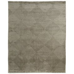 a gray rug with an abstract design on the bottom, and a square pattern in the middle