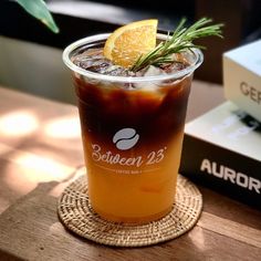 a drink sitting on top of a wooden table