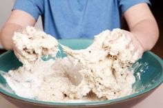 a person mixing food in a bowl