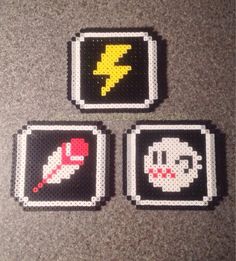 three pixelated coasters with the same design on each one, and an image of a lightning bolt