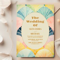 a wedding card with an art deco design