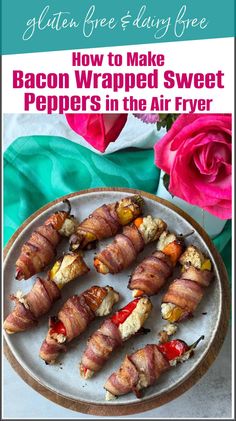 bacon wrapped sweet peppers in the air fryer on a white plate with pink roses