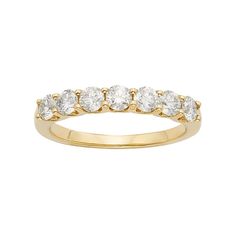 Surprise her with the exquisite elegance of this 14k gold wedding ring. A row of round-cut diamonds give it dazzling beauty she's sure to love.RING DETAILSWidth: 3.5 mmMetal: 14k goldDIAMOND DETAILSIGL certifiedTotal weight: 1 ct.Shape: roundColor grade: H-IClarity: I1Setting: prongImage(s) may be enlarged to show detail.Diamond weights are approximate. Diamond total weights may vary between .01 and .08 ct. Some diamonds have fewer than 17 facets.Please note, due to the high value of this item, Shape Ideas, Beautiful Gold Rings, 14k Gold Wedding Ring, Fine Engagement Rings, Gold Anniversary Rings, Beautiful Wedding Rings, Crown Wedding, Wedding Rings Halo, Best Engagement Rings