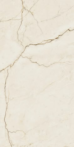 a white marble textured surface with cracks and cracks in the top right hand corner