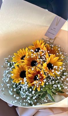 sunflowers and baby's breath in a bouquet