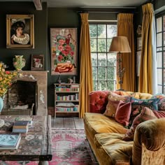 This cheerful English countryside dining room features muted sage green walls, a rustic wooden table, and lively splashes of color from a red vintage telephone booth-style cabinet and vibrant English Snug Room, Retro Living Room Aesthetic, Dark Living Room Walls, Writers Space, Countryside Color Palette, Swamp House, Romantic Interior Design, Vintage Living Room Decor, English Cottage Interiors