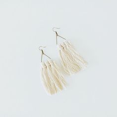 Equal parts feminine and fresh, the Pipa Earrings show unique style with the knotted macrame rope details. A whimsical take on the statement earring trend, this pair is truly a must for those who love their accessories with a punchy pop. Available online and in-Studio. // #farmhousefrocks #farmhousefrocksstyle #jewelry #boho #accessory #jewelrygram #necklace #instajewelry #bracelets #ring #homemade #fancy #artisan #artisanjewelry #freedomjewelry #fashion #fashionjewelry #positive #homemadeinusa Mia Dress, Statement Earring