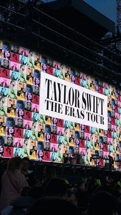 a large screen with the words taylor swift and the eras tour on it's side