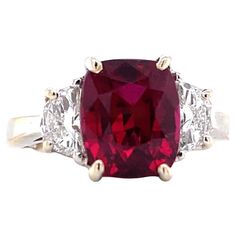 From Emilio Jewelry, a well known and respected wholesaler/dealer located on New York’s iconic Fifth Avenue,  Please inquire for more images, certificates, and details. Zoom meetings available!  Featuring a Certified gorgeous and vibrant untreated Mozambique ruby, set in a platinum custom ring. Excellent clarity and color. We here at Emilio Jewelry are experts in natural fancy colored diamonds, precious gems, and specialize in only the most valuable, rare one of kind pieces, and Important Golconda Diamond  The Emilio Jewelry design team can customize any of our pieces to your exact wishes. Emilio Jewelry is proud to be rated a 5 star dealer. Our goal is deliver the best quality jewelry, at fair prices.  Please inquire with your specific needs to see our other unlisted investment pieces. Emilio Jewelry, Golconda Diamond, Mozambique Ruby, Ruby Set, Ruby Diamond Rings, Custom Ring, Expensive Jewelry, Green Diamond, No Heat