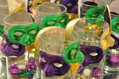 many glasses with different colored masks on them