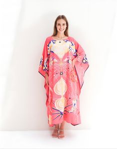 A classic ferns print on twill silk kaftan with one size fit all will be a perfect gift to her and also good for lounging home. It's flowy, soft and elegant touch.  FEATURES - Vintage print - Personal Custom Made - Full Length Kaftan Half-Sleeves - Designer Silk Kaftan - Plus Size and Custom Length - Resort Wear, Beach Wear, Lounge Wear, Pool Cover Up Kaftan - crew -------------------------------- DETAIL  * Length : 130 CM & Width 130 CM * Please note, we don't provide exact in dimension but will try best to reach the request, error 1-4 cm may occur due to fabric' nature, manually cutting & sewing, etc. -------------------------------- FREE Customization service - Cut shorter from the 130 CM  -------------------- FABRIC *Silk Twill 90% + 10 % Viscose ( The fabric is soft, cool, not stick t Oversized Silk Bohemian Kaftan, Silk Floral Print Kaftan For Beach Cover-up, Flowy Silk Maxi Length Kimono, Silk Maxi-length Printed Kimono, Pink Printed Kaftan For Beach Cover-up, Elegant Pink Printed Kaftan, Beachwear Dress With Silk Kimono Sleeves, Printed Maxi Dress With Kimono Sleeves For Beach, Printed Silk Long Maxi Dress