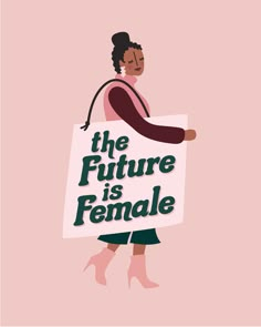 a woman holding a sign that says the future is female